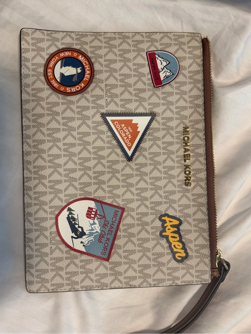 Michael Kors Beige Logo Wristlet Pouch with Multicolor Patch Accents